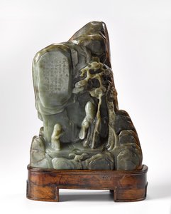 道教の創始者、清朝時代の玉子である老子の姿が描かれた山の風景の形をした筆置き